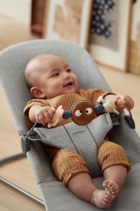 Babybjörn wipstoeltje relax speeltjes Speelboog - Ondeugende oogjes Pastels