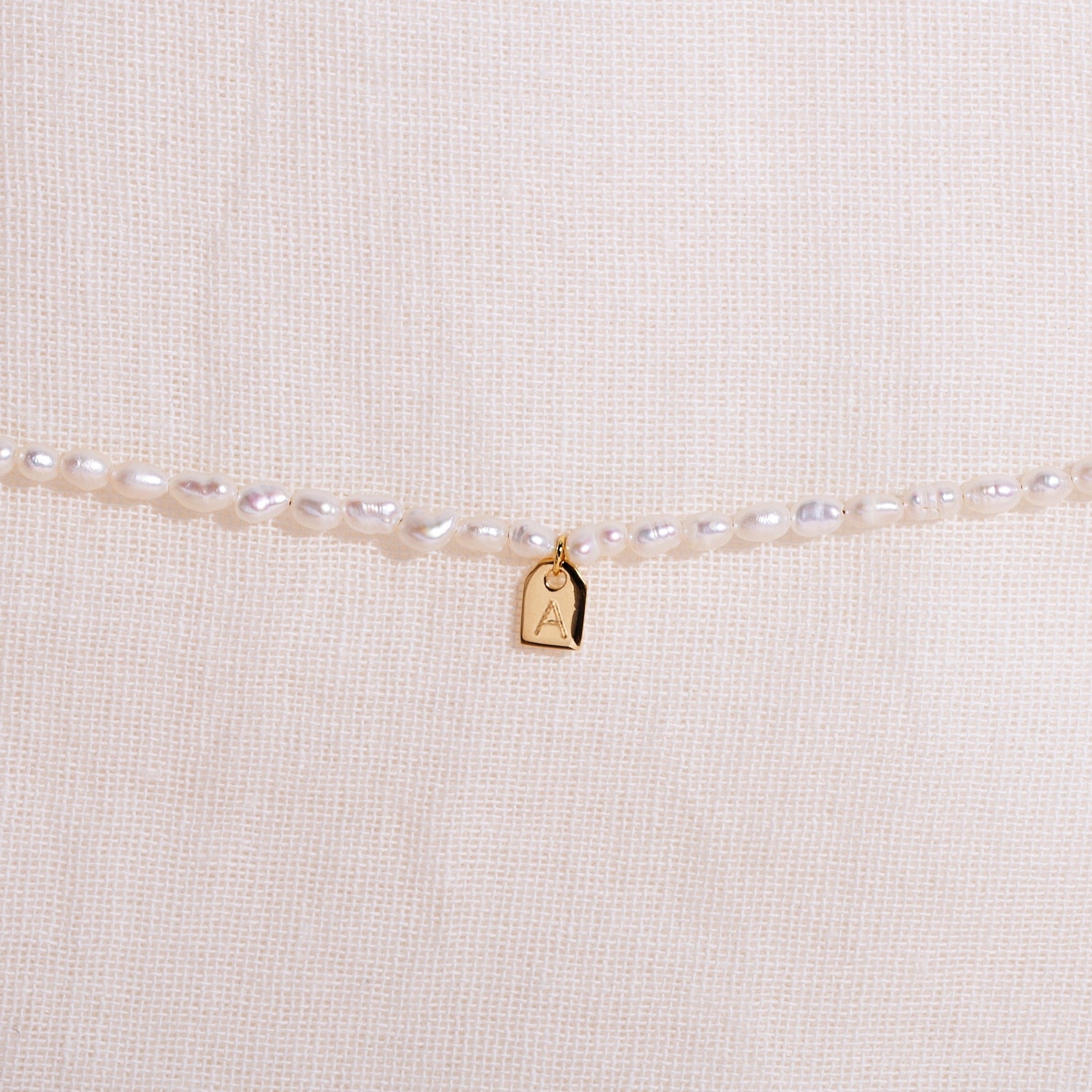 Galore Gepersonaliseerde Armband Pearl & Tag | Gold Baby