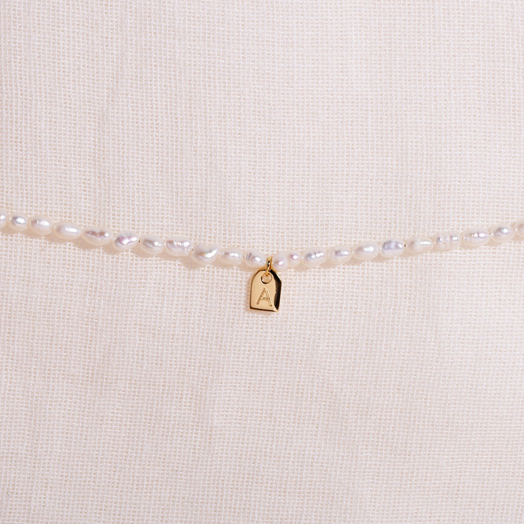 Galore Gepersonaliseerde Armband Pearl & Tag | Gold Baby